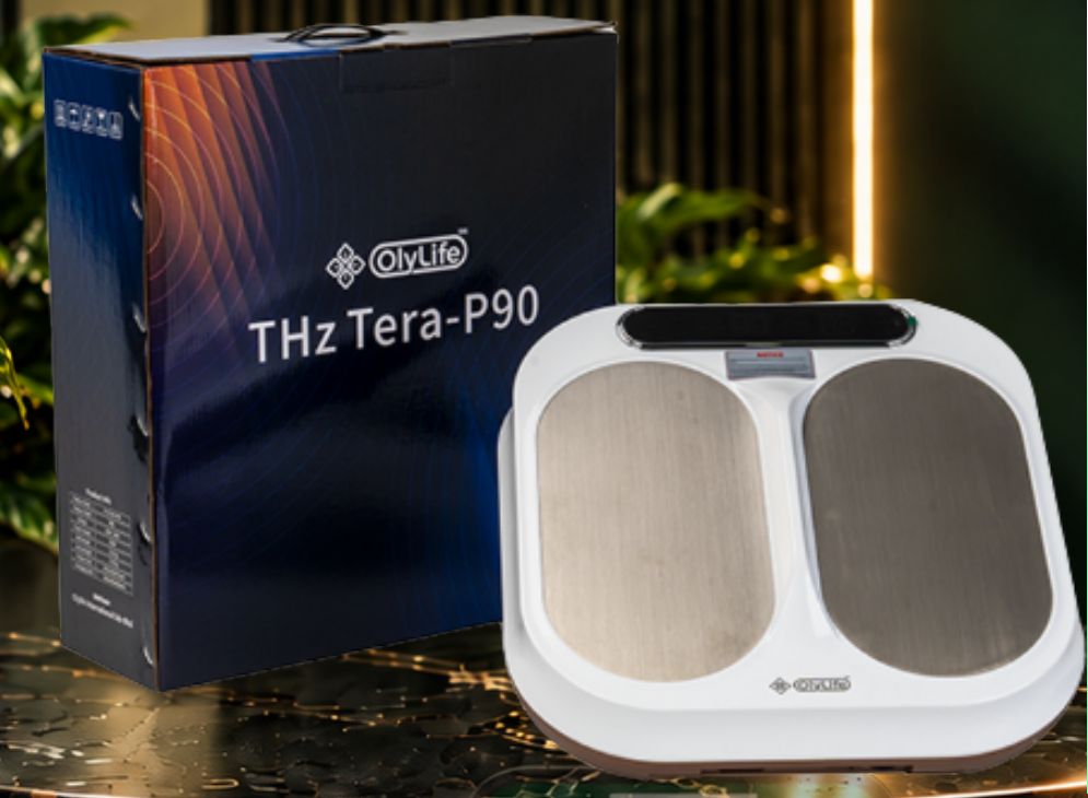 OlyLife THz Tera-P90 apparat til fødderne foran den blå produktæske